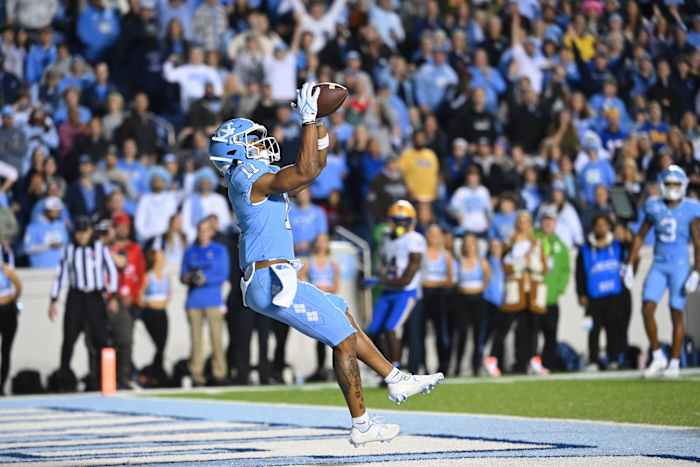 Oct 29, 2022; Chapel Hill, North Carolina, USA; North Carolina Tar Heels wide receiver Josh Downs (11) catches a touchdown pass in the fourth quarter at Kenan Memorial Stadium. Mandatory Credit: Bob Donnan-USA TODAY Sports